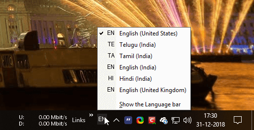 صورة لـ كيفية إظهار أو إخفاء مُؤشر الإدخال وشريط اللغة في نظام Windows 10 | input-indicator-win10-language-bar-in-action-DzTechs