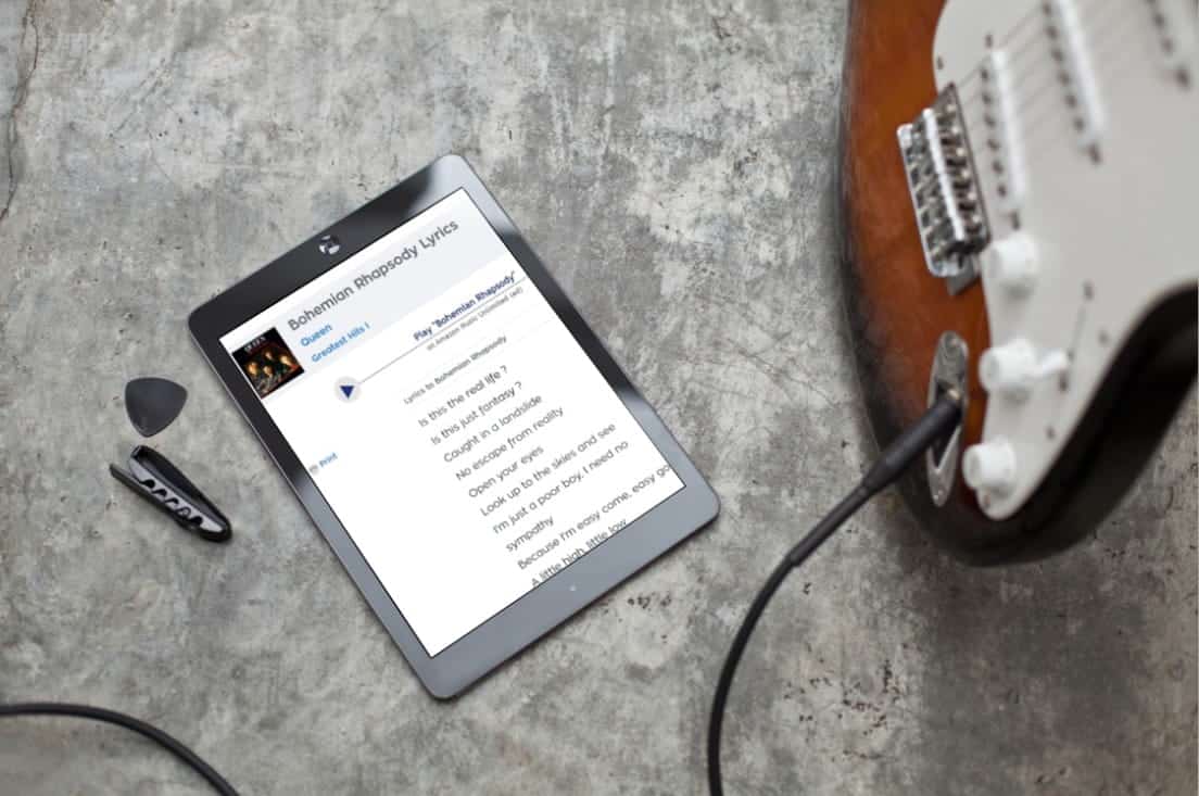 صورة لـ أفضل المواقع للعثور على كلمات الأغاني عبر الانترنت | Black_iPad_Air_guitar-dcKmGSfs-DzTechs