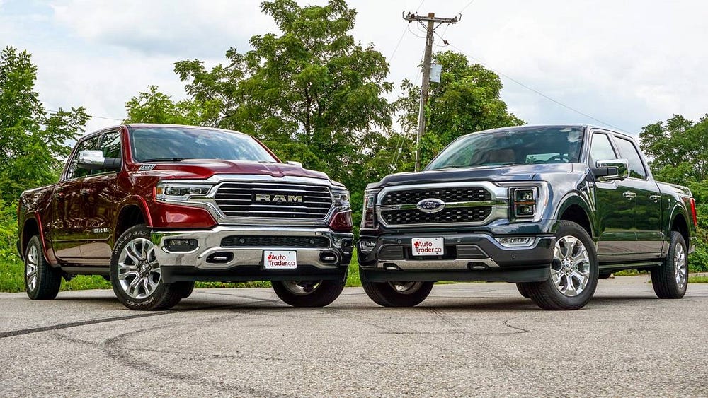 صورة لـ مقارنة بين Ram 1500 REV و Ford F-150 Lightning: أي من سيارات البيك آب الكهربائية تتفوق؟ | 1tdZuNux4QMdGuvRlUZ_Oig-DzTechs