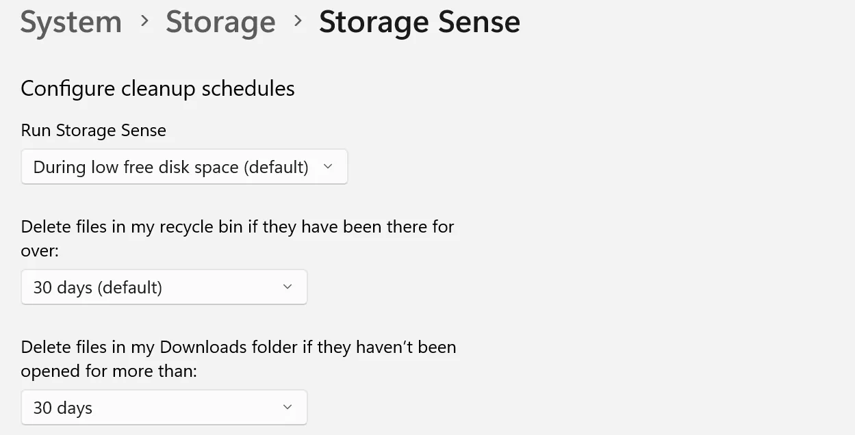 Configuring cleanup schedule for Storage Sense in the Settings app on Windows.