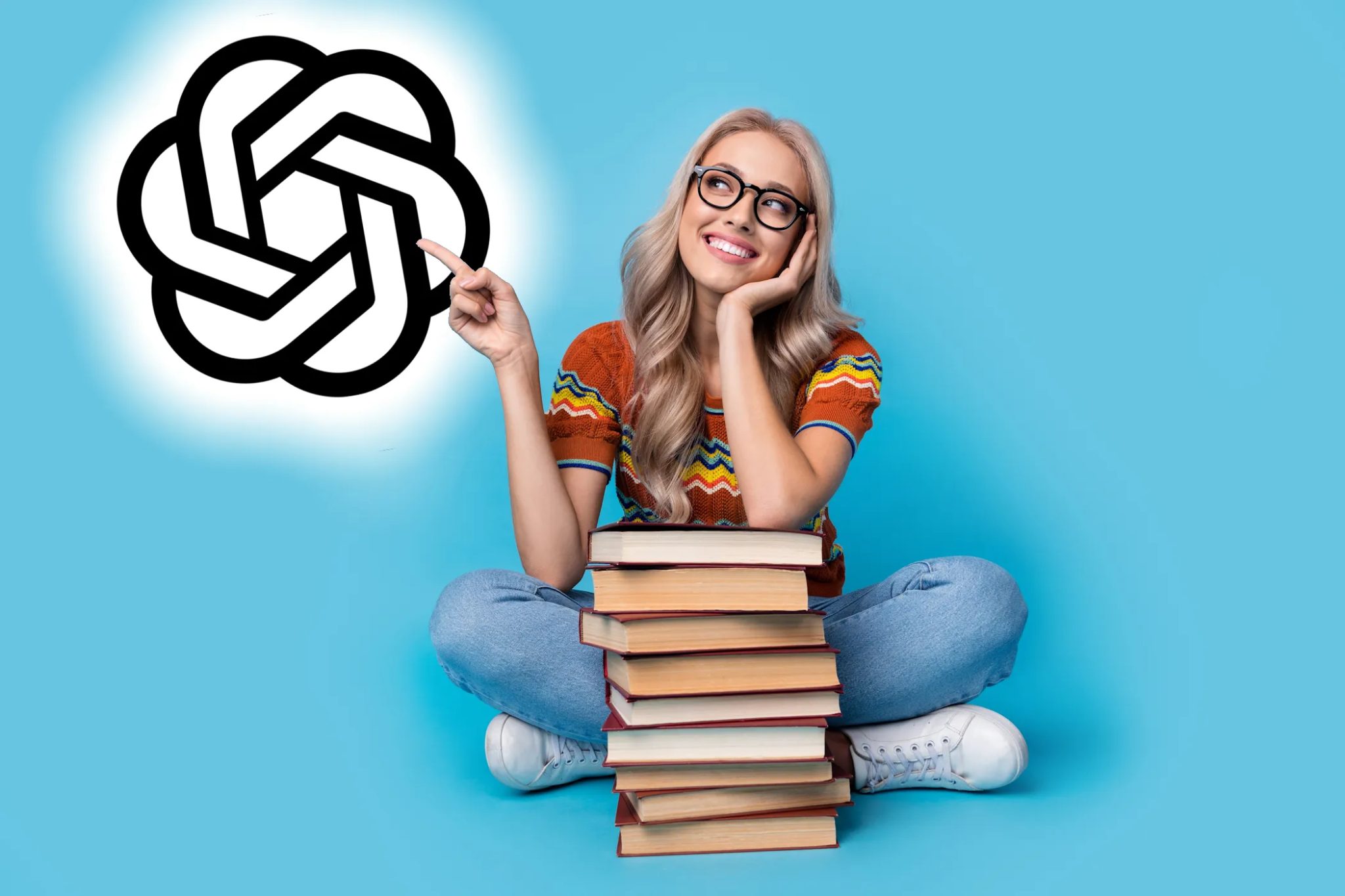 امرأة مع كومة كتب تشير إلى شعار ChatGPT