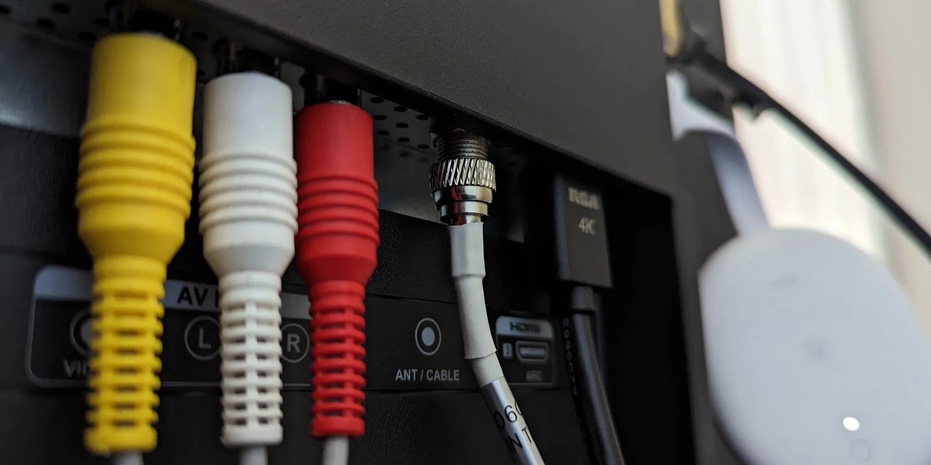 TV connector cables attaching an indoor TV antenna
